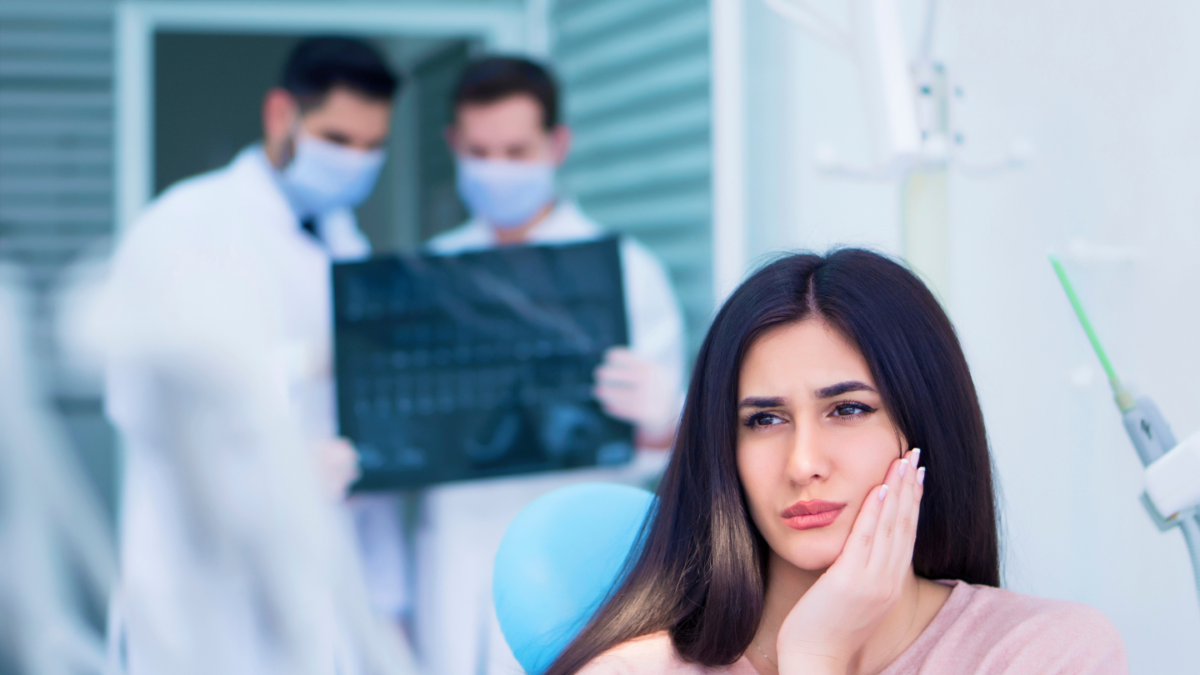 What are the symptoms of a failed root canal